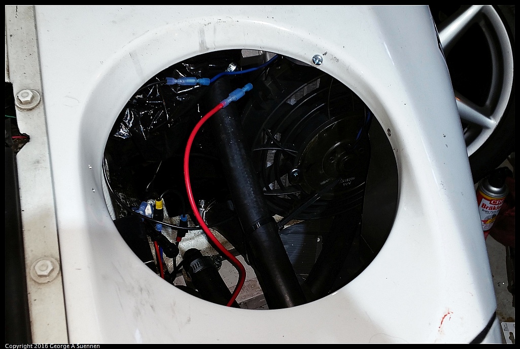20160814_190900.jpg - New intercooler heat exchanger and fan mounted in driver's side fender